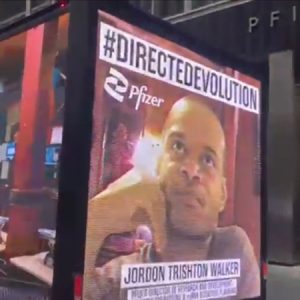 Giant Digital Billboard Outside Pfizer HQ Shows Director’s ‘Mutated Virus’ Comments on Repeat